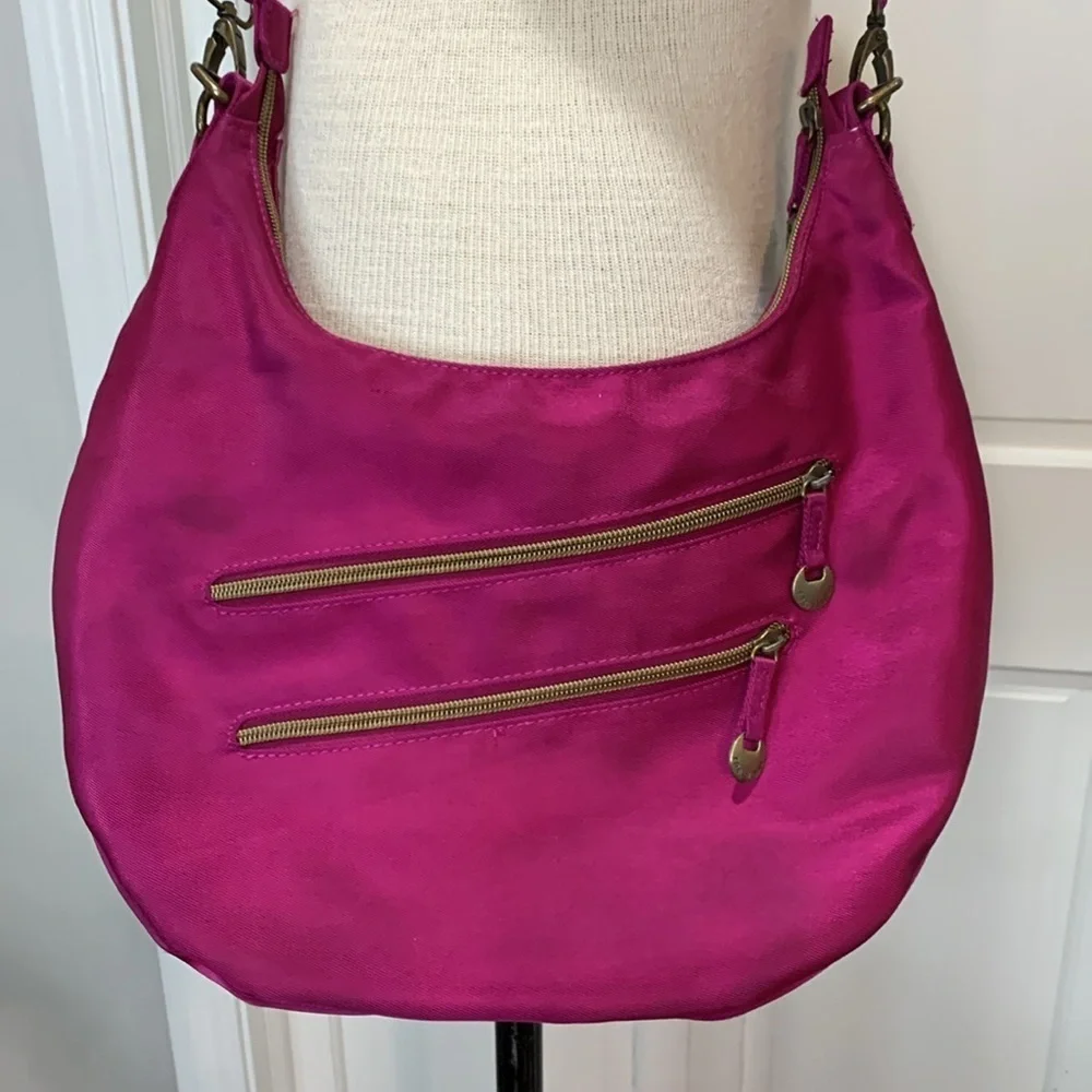 Travelon magenta cloth purse withh adjustable strap